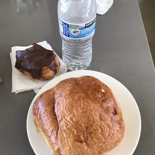 Water bottle for size. Bigger than my hand. Lots of ham and some white cheese. Delicious!