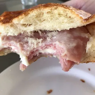 Tons of ham and gooey cheese. Huge but not greasy. Perfect for lunch.