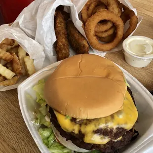 Over cooked cheeseburger, cold fries and onion rings, but piping hot fried pickles!!