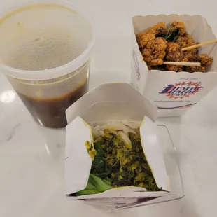 two take out boxes of food