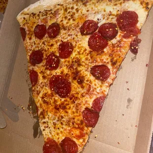 a slice of pepperoni pizza