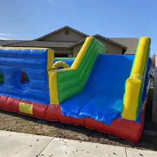 Obstacle course with slide