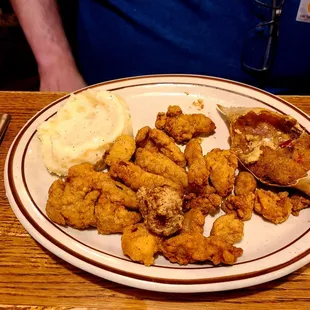 Seafood Platter - build your own comes with homemade patatoes of any kind, baked mashed or fried quarters.  We liked the mashed with gravy.