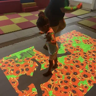 Giant tablet on the floor