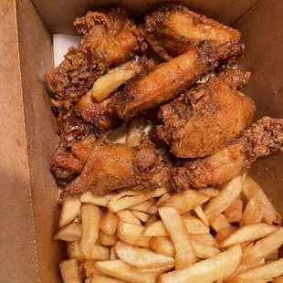 Honey old bay wings with fries