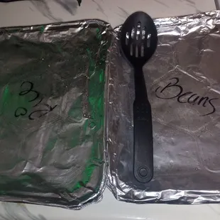 This was the small pan of beans and rice that was supposed to cover 70 people! I put a serving spoon on it to show how small the pans were.