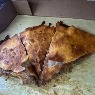 Birria pizza (supposed to have extra cheese but it didn&apos;t have any cheese at all )  , it could have been extra delicious