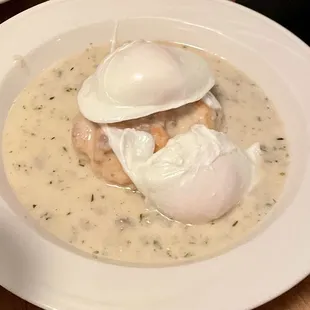Biscuits and gravy with poached eggs