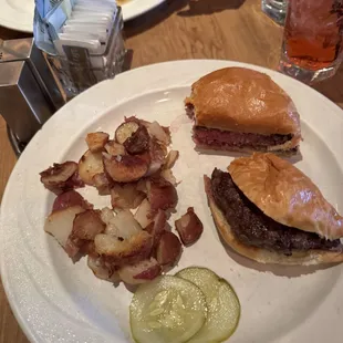 Hamburger with sautéed redskin potato.