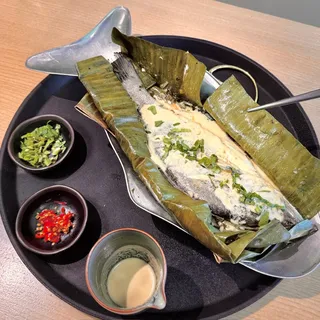 Banana leaf wrapped seabass
