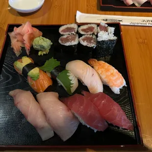 Sushi Combo B which included 2 tuna, 2 yellowtail, 1 salmon, 1 white tuna, 1 squid, 1 shrimp, and 1 tuna roll