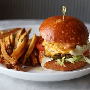 a cheeseburger and fries
