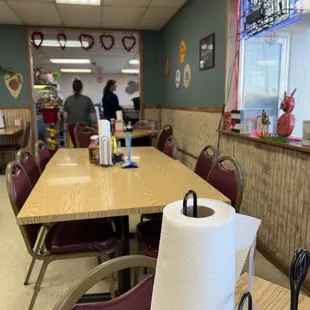a table with a roll of toilet paper on it