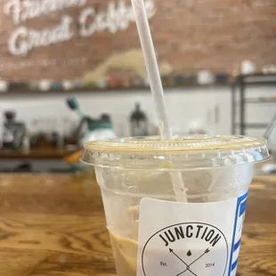 Pineapple + coconut + oat milk + decaf espresso summer drink