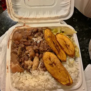Stew peas, plantains,rice and vegetables.