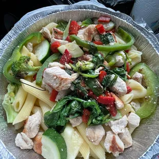 Chicken Alfredo Penne Pasta with bell pepper, zucchini, and spinach.