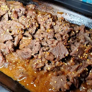 a beef dish in a pan