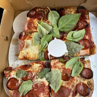 Pepperoni with fresh basil