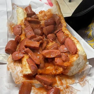 a hot dog on a bun