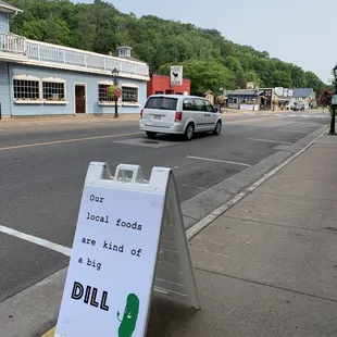 a sign on the side of the road