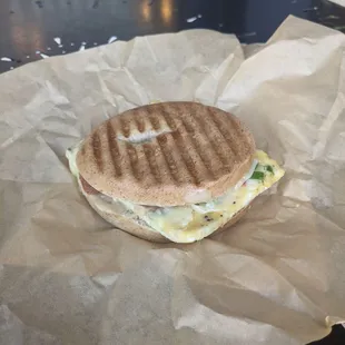 Bagel breakfast sandwich with bacon.