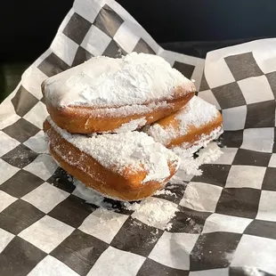 Fresh Beignets. They don&apos;t hold back on the powder sugar. 10/10