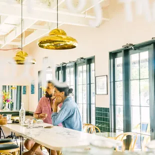 a group of people in a restaurant