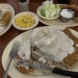 Chicken fried steak, mashed potatoes and gravy, corn, salad with homemade ranch dressing and a fried catfish filet!!