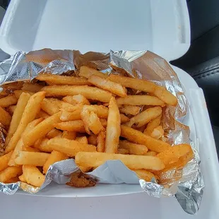 Seasond fries. Tasty,,, they was in box for few minutes sweated due to they were hot. I'll just ask for lil more crisp on fries.