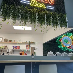 Food prep in front of seating area. Restaurant decorated like being in jungle!