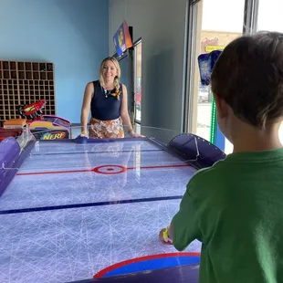 Air hockey in the arcade