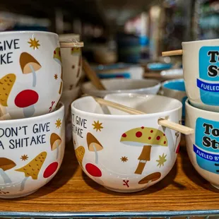 a variety of bowls and chopsticks