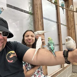 My daughter and I having a parakeets experience.