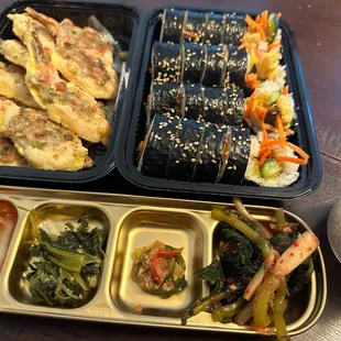 Kimbap, shrimp Jun, variety of kimchi and their fresh made shikhye