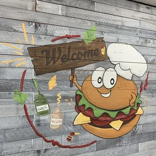 a chef holding a sign