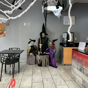 two children dressed up as witches