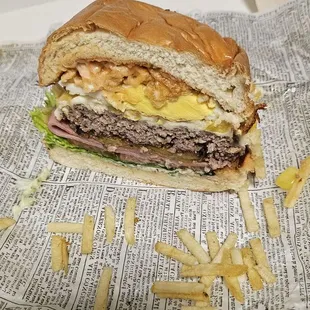 Beef Explosion Burger cut in half to see the many layers