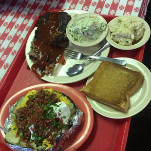 Dinner plate double ribs and great cut of beef.   Loaded potato was no joke.