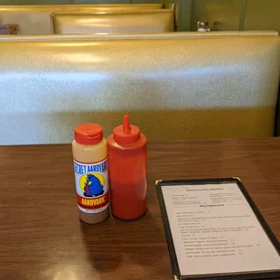 Ketchup, Secret Aardvark hab sauce and, best of all, comfy gold-lame booth seating.