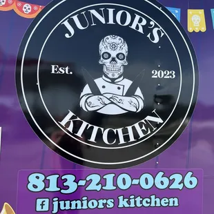a sign for junior's kitchen