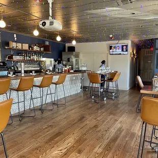 Beautiful upstairs space with another bar and 2 unisex restrooms