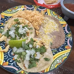 Chicken tacos with rice and beans