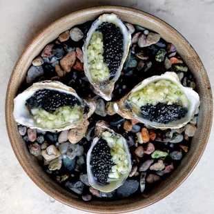 Oysters with cucumber and caviar