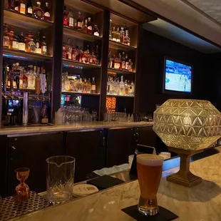 a bar with a television in the background