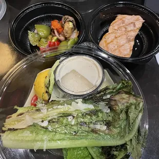 Wood Grilled Salmon Romaine salad and a side of veggies