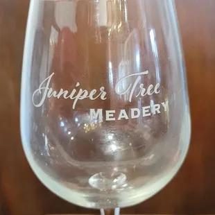 a wine glass on a table