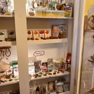 Items in the store: HEALING STONES,  GLASSWARE, BOOKS, FISHING ITEMS, LAMPS, ANTIQUES, JEWELRY, TOOLS AND MUCH MUCH MORE...