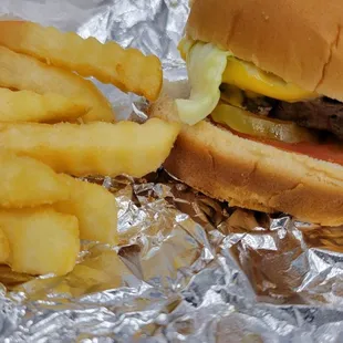 Cheeseburger and crinkle cut fries