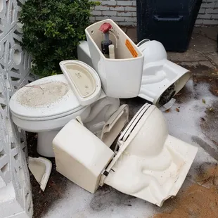 Old toilets getting hauled away