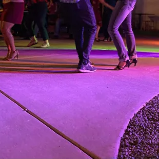 a couple dancing on the dance floor
